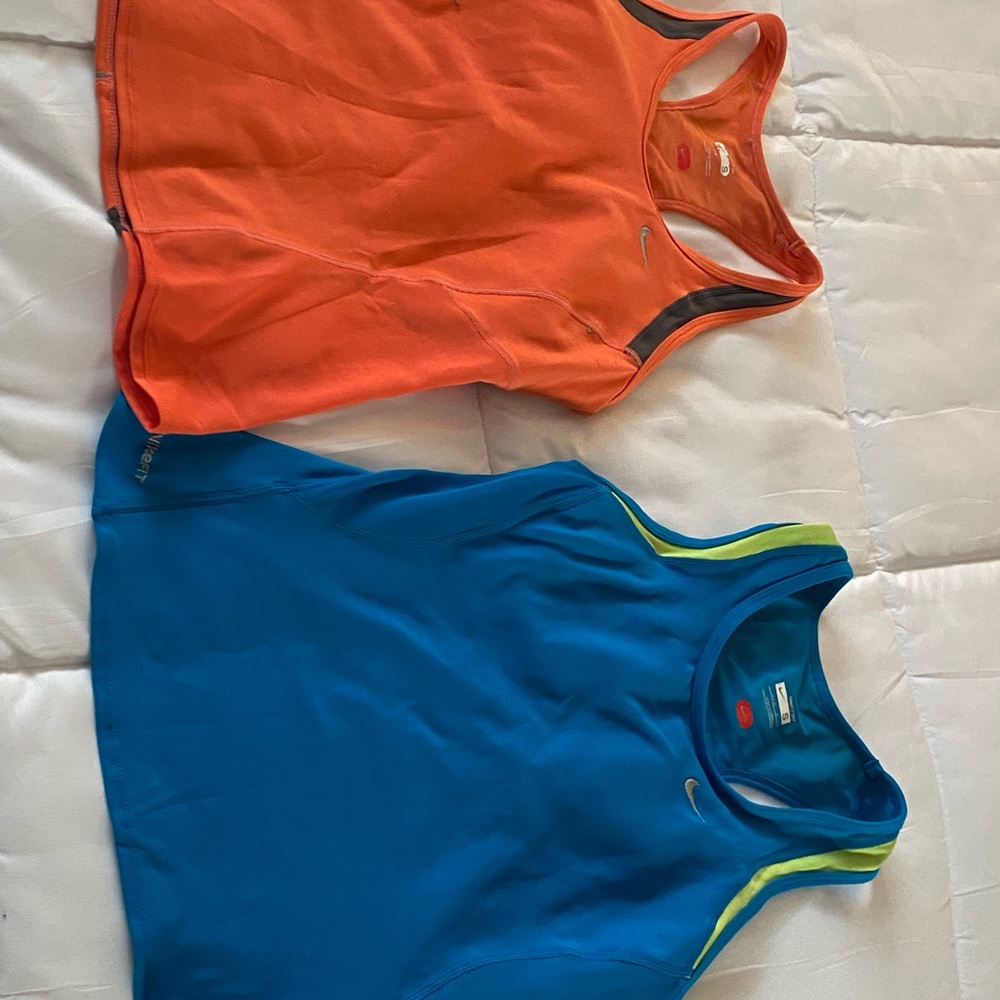 Two Nike running Tops size small.  Blue and Orange